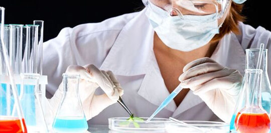 Scientist pipetting a sample in the laboratory